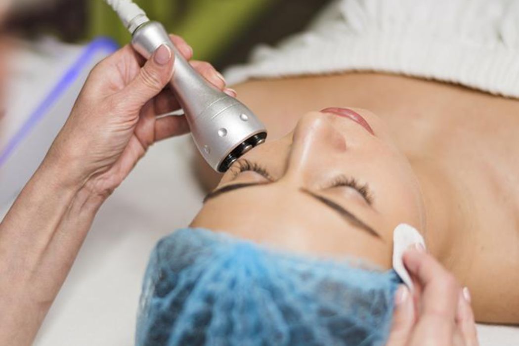 Skincare professional performing a corrective facial treatment to improve skin texture at Namaste Skincare & Wellness in Henderson, Nevada.