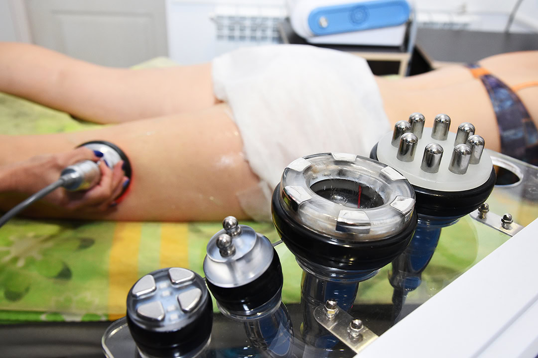 Radiofrequency (RF) device used during a non-surgical body contouring treatment at Namaste Skincare & Wellness in Henderson.