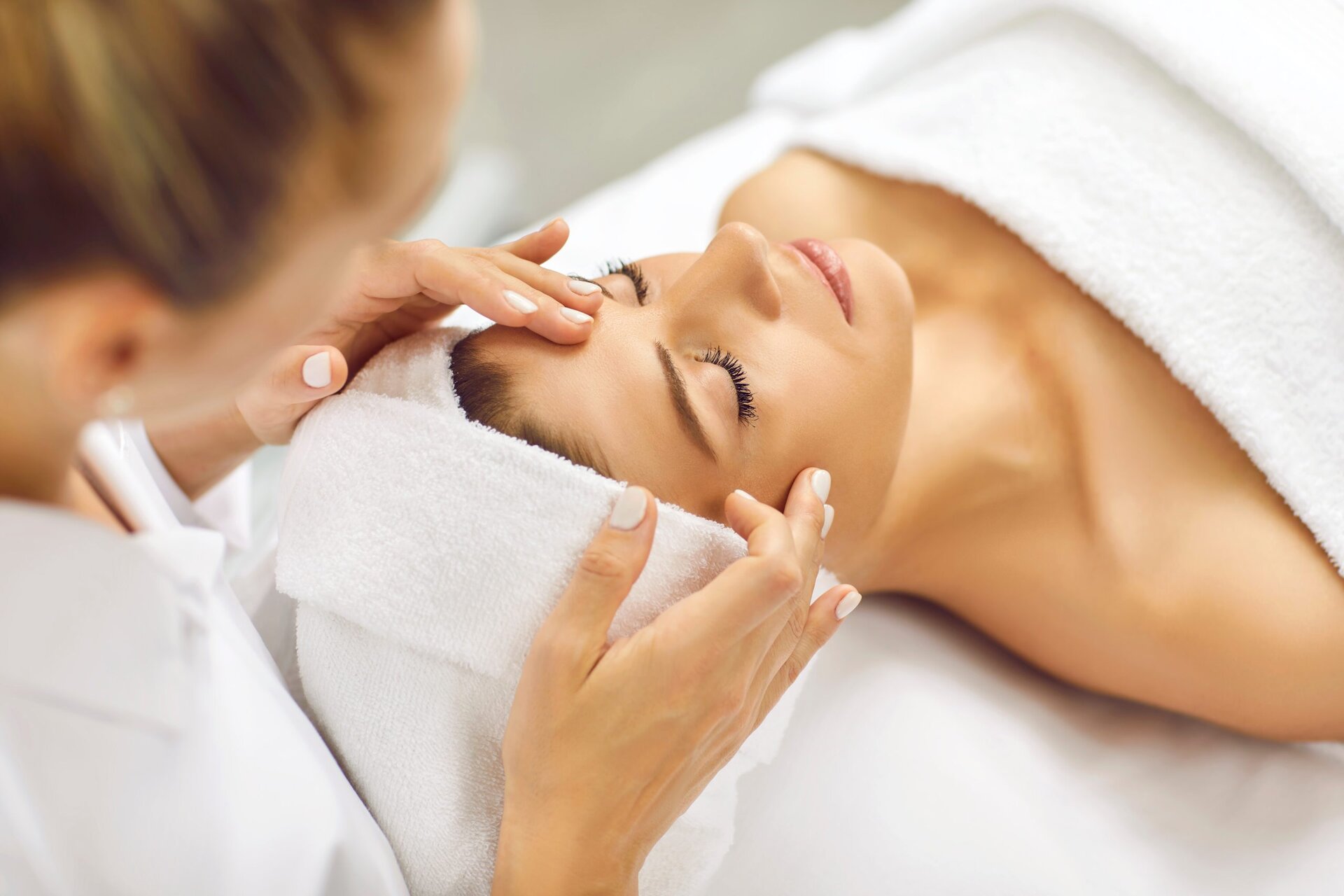 A client receives a relaxing facial with facial cupping therapy at Namaste Skincare & Wellness in Henderson. This spa service add-on promotes circulation and rejuvenation in a calm, professional setting.